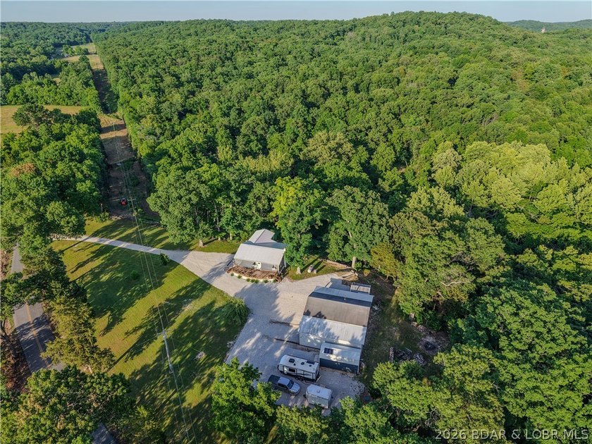 New price on this Lake area retreat on 3 acres with garage/RV - photo 48