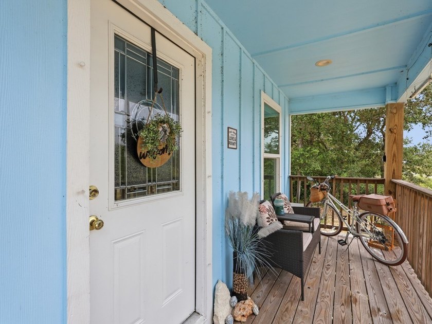 Built in 2021, this 3-bedroom, 2-bath coastal cottage sits on - photo 2