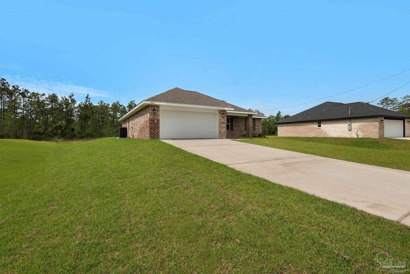 MOVE-IN READY NEW CONSTRUCTION ON 0.5 ACRES! // The *OSCEOLA* - photo 5