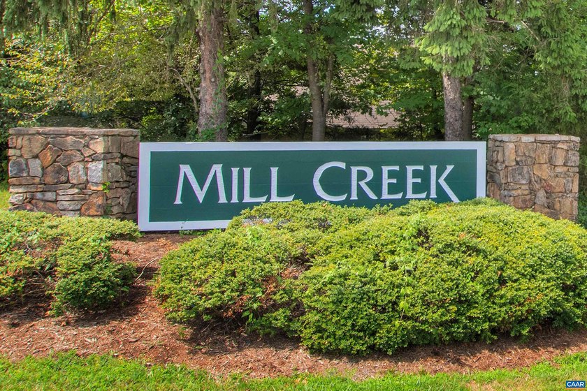Nestled on a quiet cul-de-sac in Mill Creek Village, this - photo 4