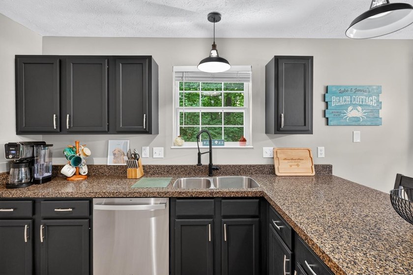 This 3-bedroom ranch offers a spacious, functional layout with a - photo 13