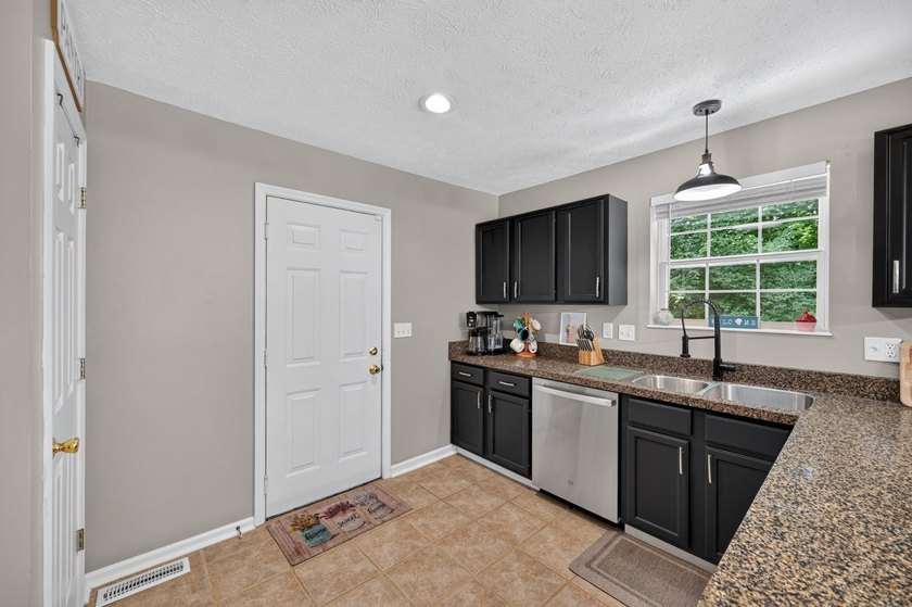 This 3-bedroom ranch offers a spacious, functional layout with a - photo 14