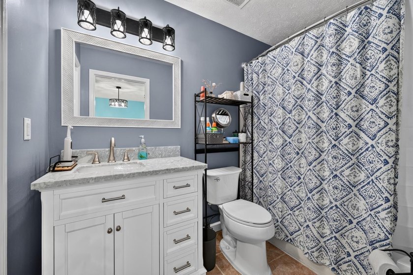 This 3-bedroom ranch offers a spacious, functional layout with a - photo 18
