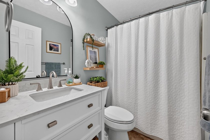 This 3-bedroom ranch offers a spacious, functional layout with a - photo 22