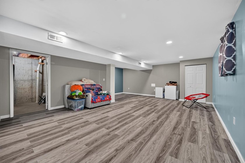 This 3-bedroom ranch offers a spacious, functional layout with a - photo 24