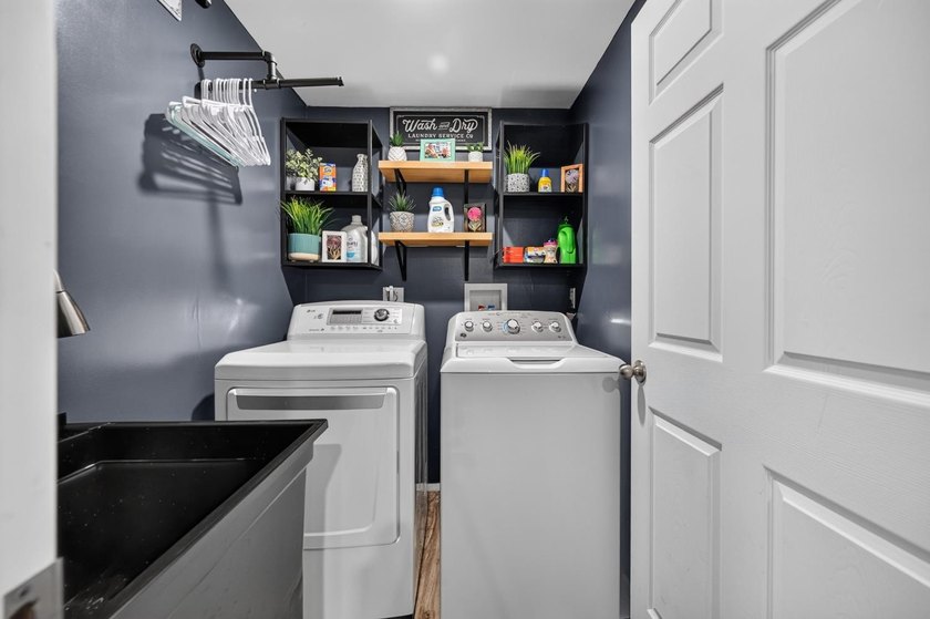 This 3-bedroom ranch offers a spacious, functional layout with a - photo 26