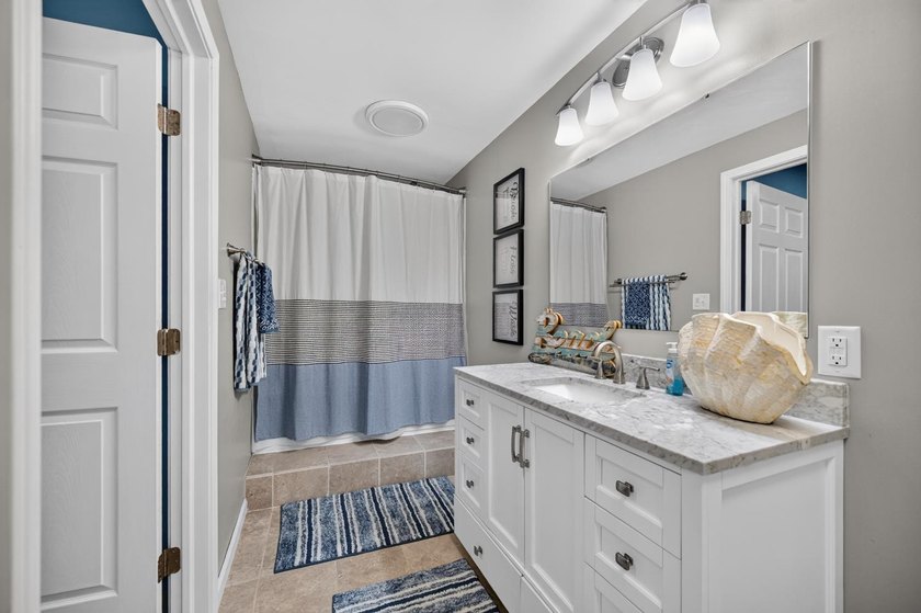 This 3-bedroom ranch offers a spacious, functional layout with a - photo 27