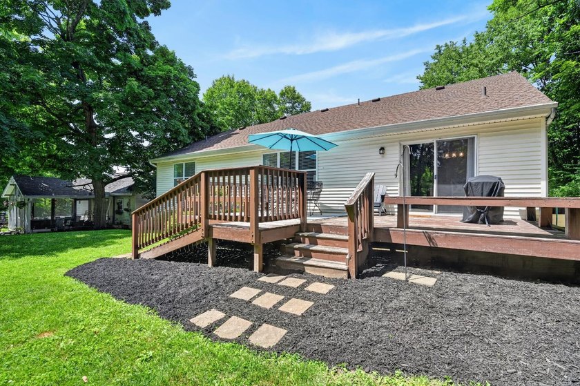 This 3-bedroom ranch offers a spacious, functional layout with a - photo 35
