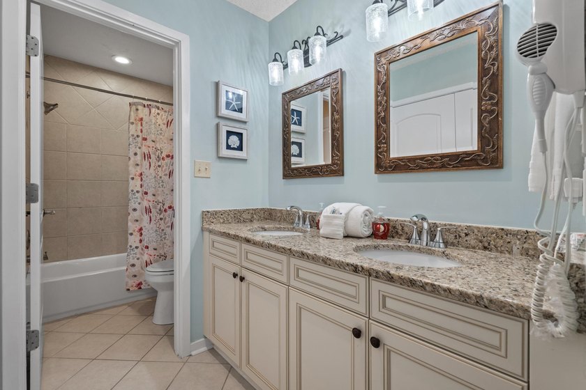 Welcome to this 2-bedroom, 2-bathroom condo in the prestigious - photo 17
