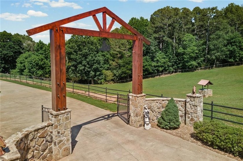 CHEROKEE COUNTY 19.9 ACRE COUNTRY ESTATE/HORSE FARM!! Nestled in - photo 5