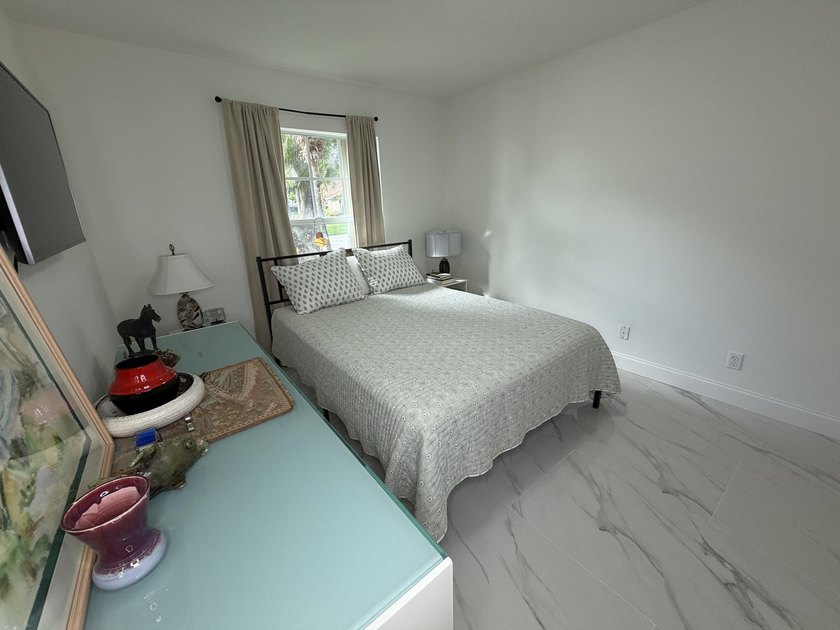Located in the desirable Tuscany Bay community, this charming - photo 16