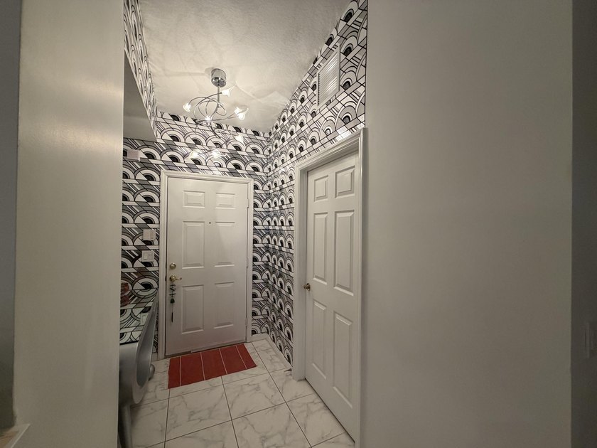 Located in the desirable Tuscany Bay community, this charming - photo 19