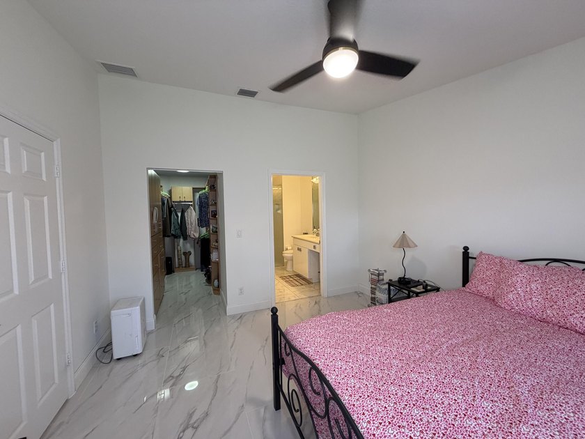 Located in the desirable Tuscany Bay community, this charming - photo 24