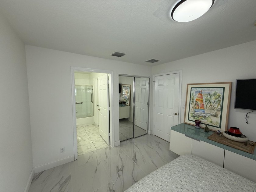 Located in the desirable Tuscany Bay community, this charming - photo 32