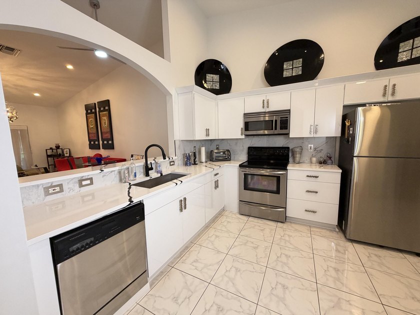 Located in the desirable Tuscany Bay community, this charming - photo 40