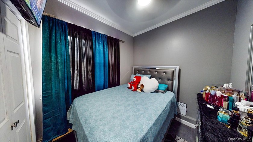 This beautifully maintained legal 3-family semi-detached home - photo 7
