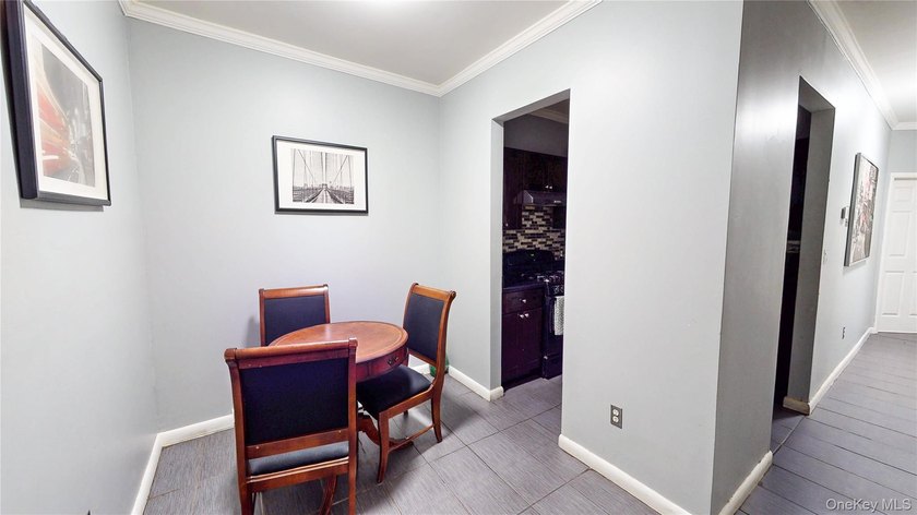 This beautifully maintained legal 3-family semi-detached home - photo 9