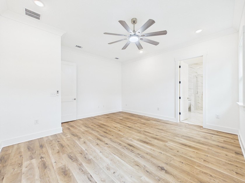 This spacious single-story residence offers a seamless blend of - photo 22