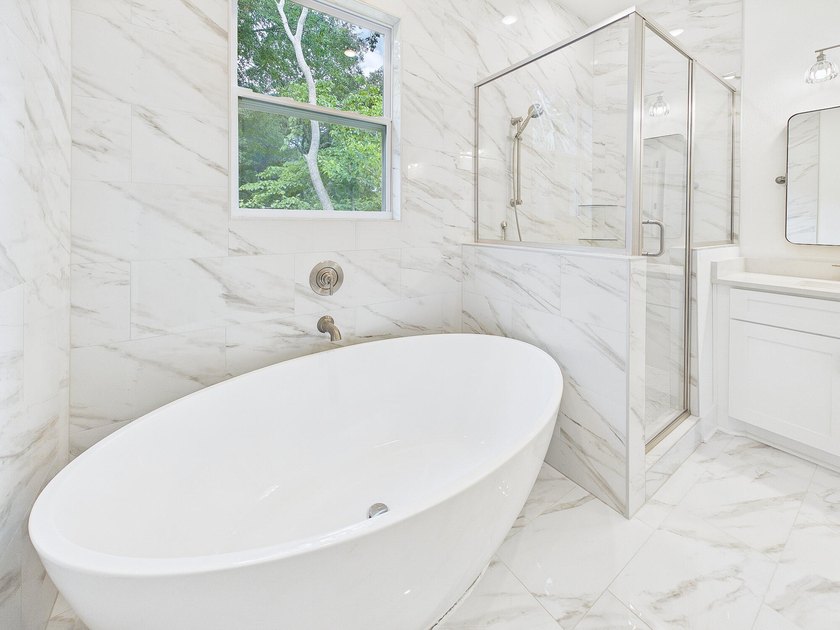 This spacious single-story residence offers a seamless blend of - photo 26