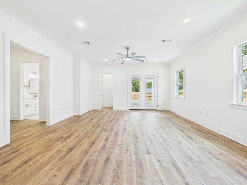 This spacious single-story residence offers a seamless blend of - photo 33