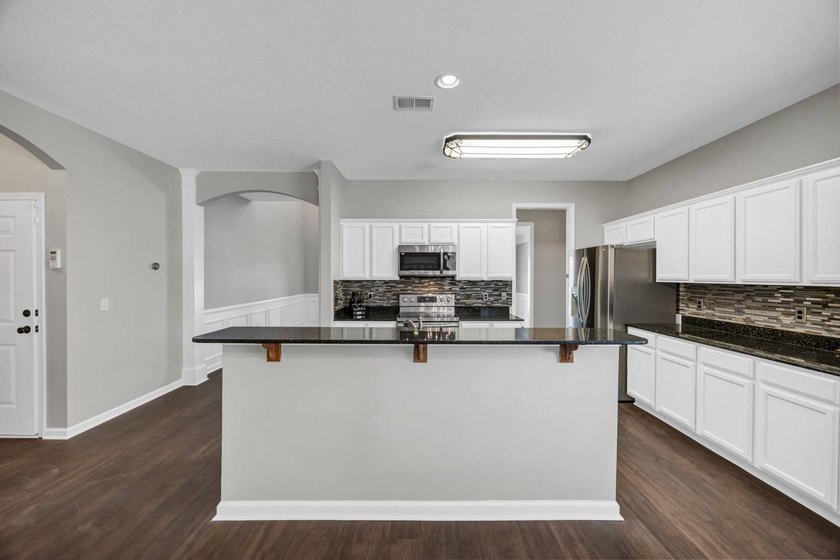 Stunning all brick home with exceptional curb appeal, featuring - photo 12