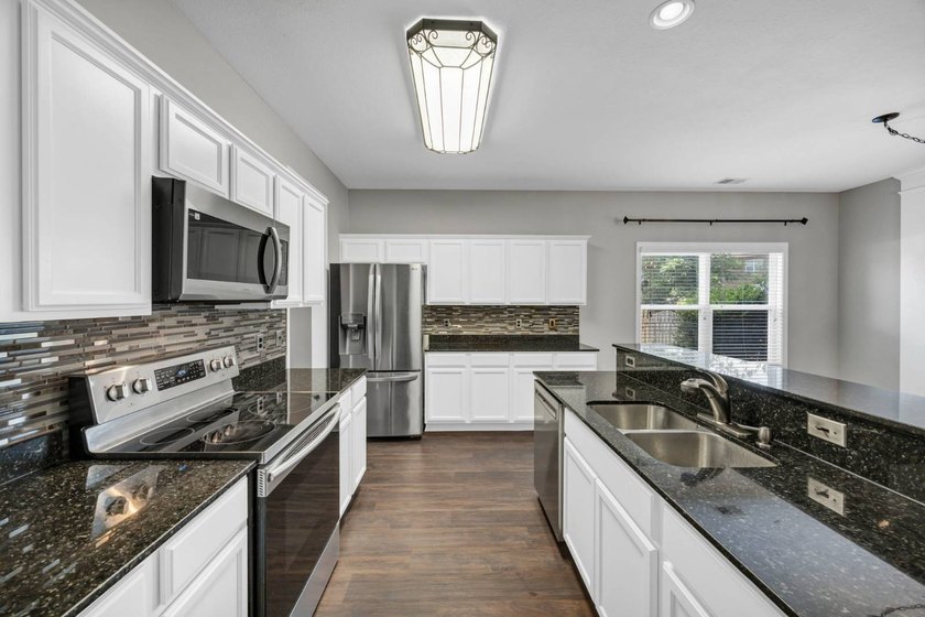 Stunning all brick home with exceptional curb appeal, featuring - photo 14
