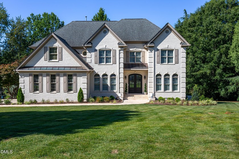 Classic elegance meets refined modern living in this exceptional - photo 2