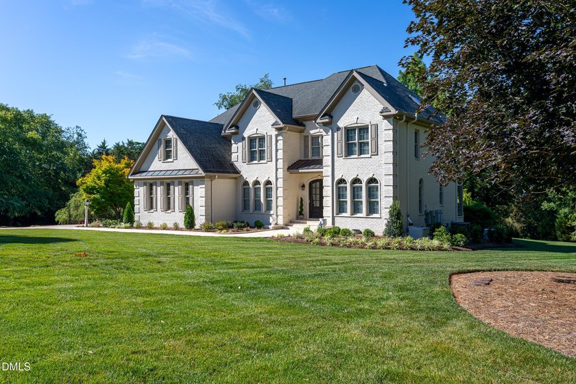 Classic elegance meets refined modern living in this exceptional - photo 5