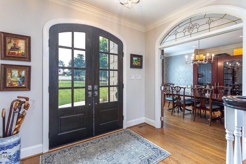 Classic elegance meets refined modern living in this exceptional - photo 6