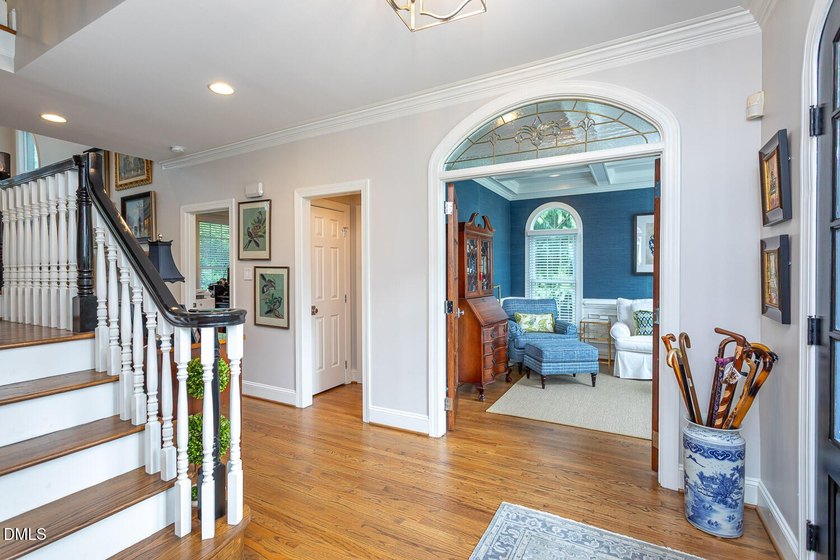 Classic elegance meets refined modern living in this exceptional - photo 7