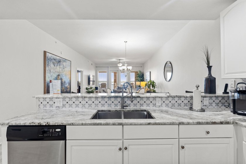 Set against the sparkling waters of Lake LBJ, this turn-key - photo 8