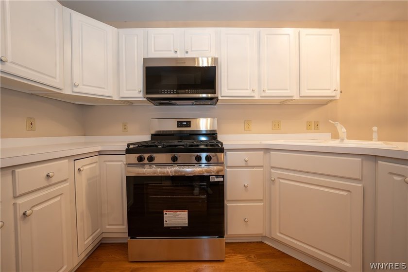 Welcome to this well-maintained 2-bedroom, 2.5-bath condo in the - photo 7