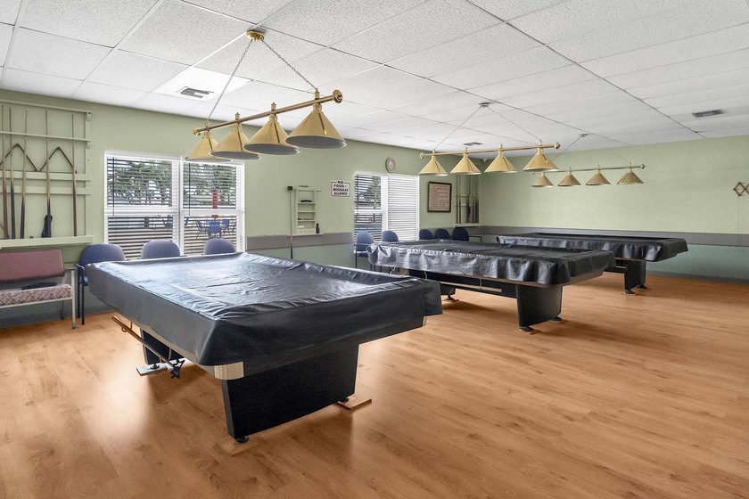 Welcome to this beautifully updated villa, featuring a spacious - photo 34