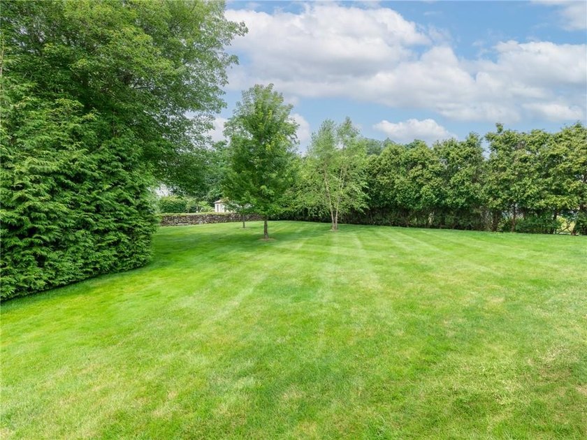 Nestled on a private and picturesque .83 acre lot set back from - photo 45