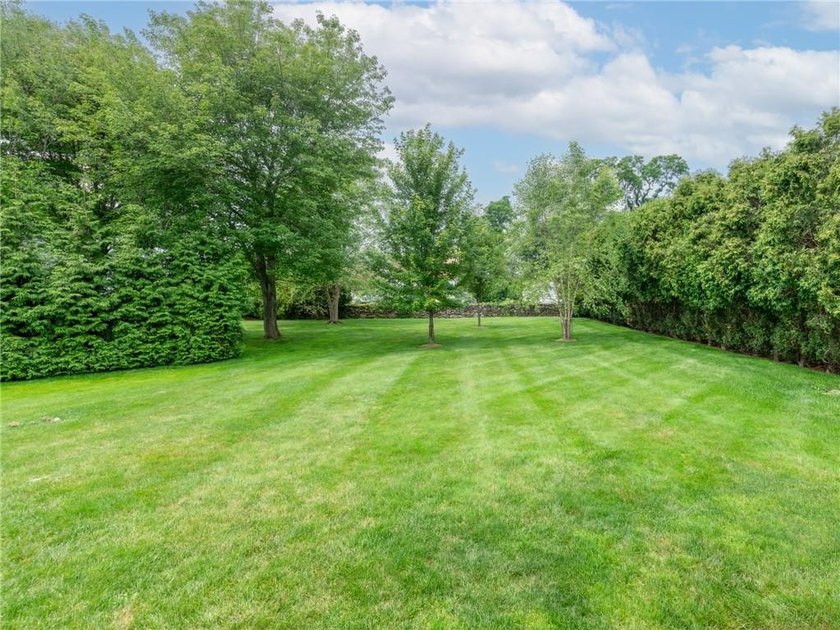 Nestled on a private and picturesque .83 acre lot set back from - photo 46