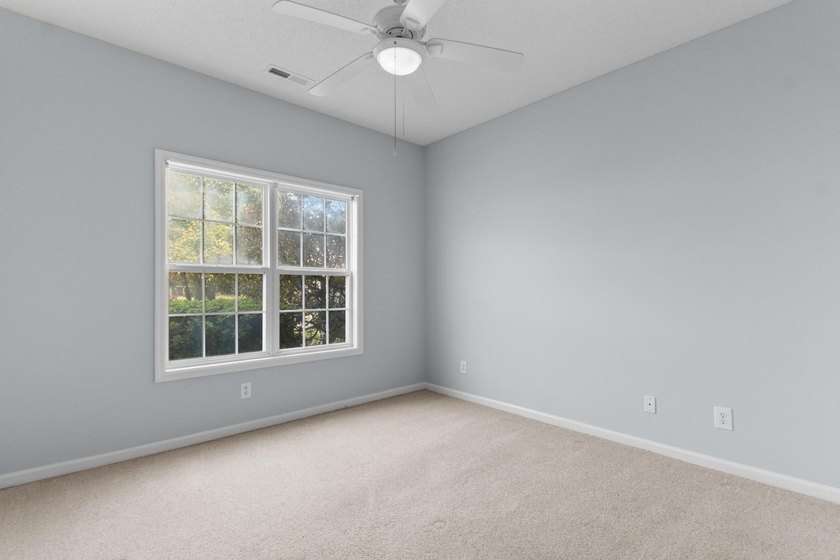 Tucked along a peaceful pond in the Lighthouse Pointe at - photo 28