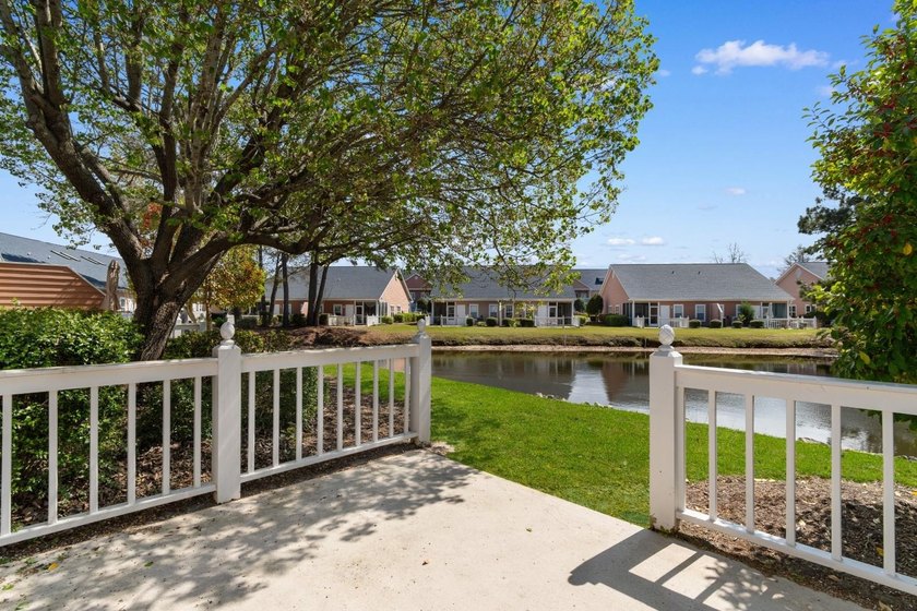 Tucked along a peaceful pond in the Lighthouse Pointe at - photo 31