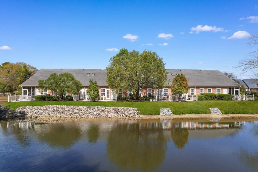 Tucked along a peaceful pond in the Lighthouse Pointe at - photo 35