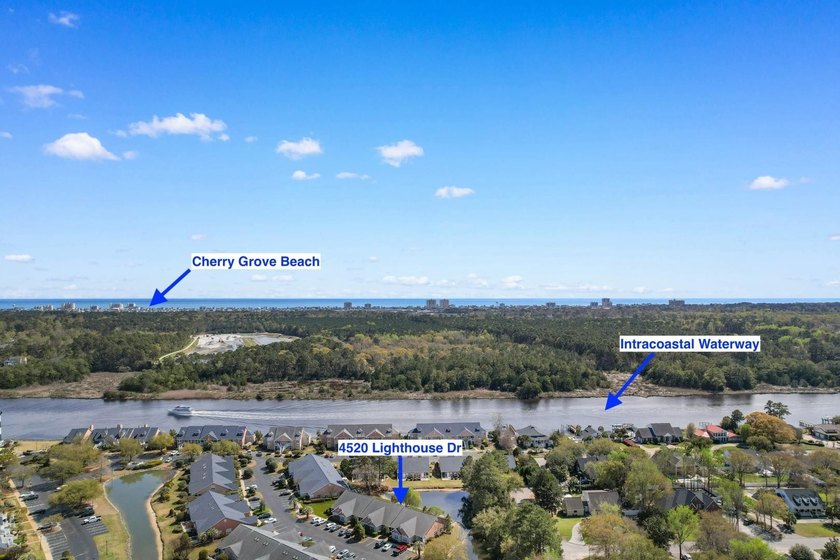 Tucked along a peaceful pond in the Lighthouse Pointe at - photo 37