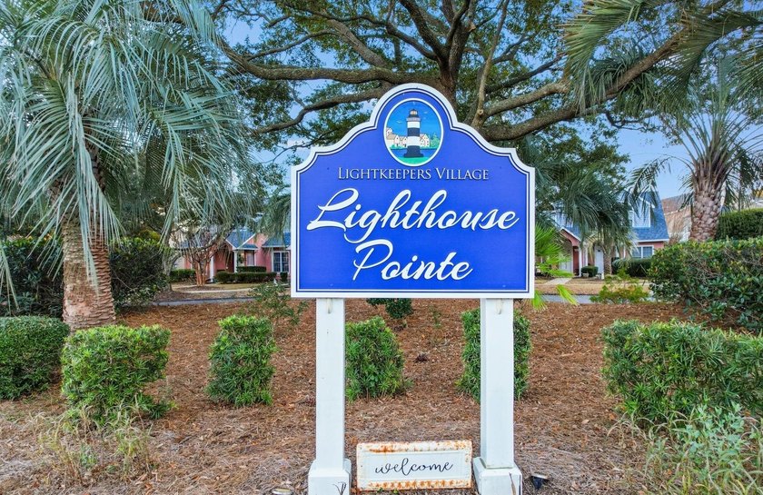 Tucked along a peaceful pond in the Lighthouse Pointe at - photo 43