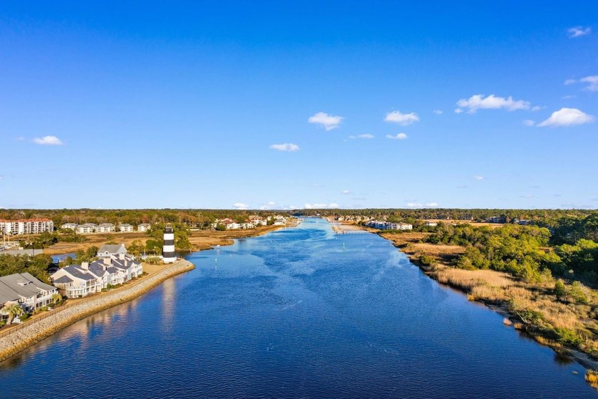 Tucked along a peaceful pond in the Lighthouse Pointe at - photo 45