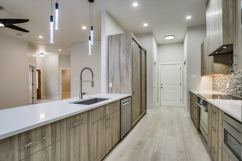 LOCATION! CUSTOM! UPGRADES! BUILDERS PERSONAL HOME WITH UPGRADES - photo 10