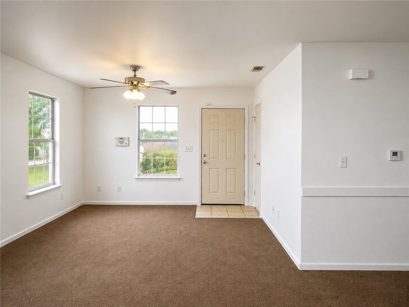 Nestled on a spacious corner lot, this charming 3-bedroom - photo 4