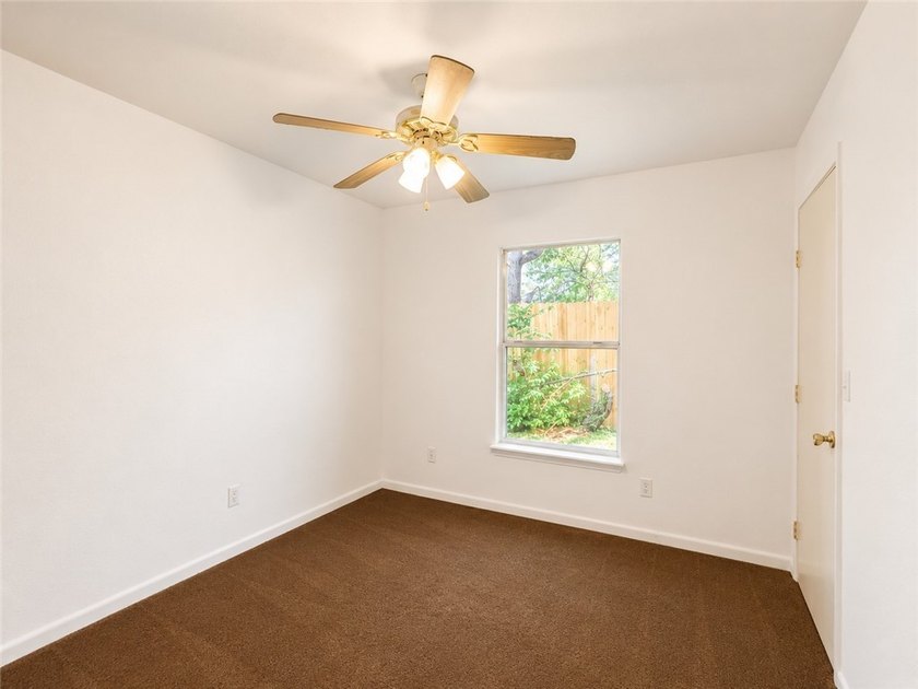 Nestled on a spacious corner lot, this charming 3-bedroom - photo 9