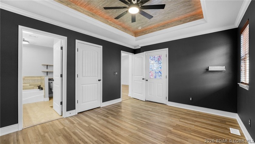 Experience lake living at its best in this beautifully updated - photo 11