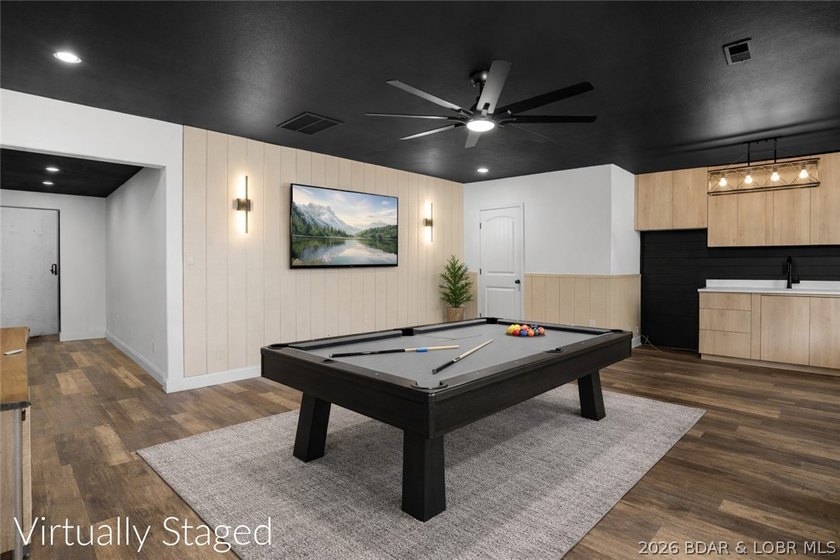 Experience lake living at its best in this beautifully updated - photo 24