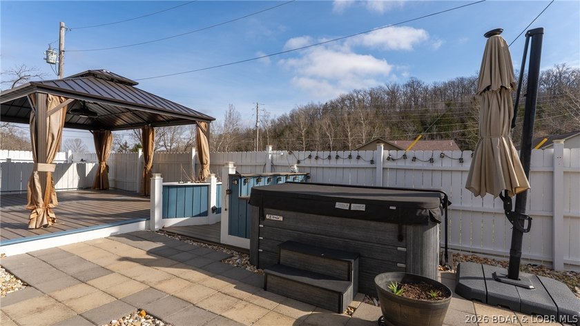 Experience lake living at its best in this beautifully updated - photo 34
