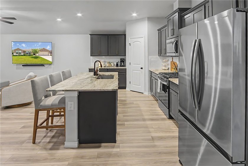 Welcome to this beautifully maintained one-story home in the - photo 4