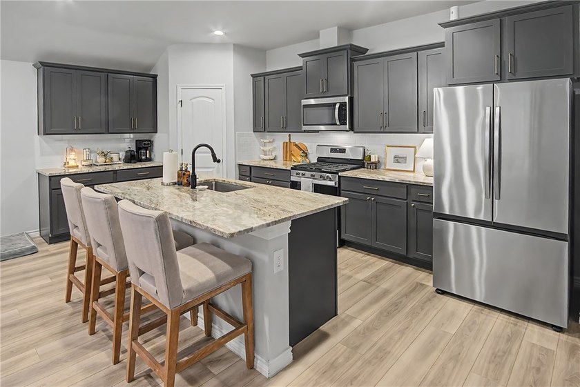 Welcome to this beautifully maintained one-story home in the - photo 5