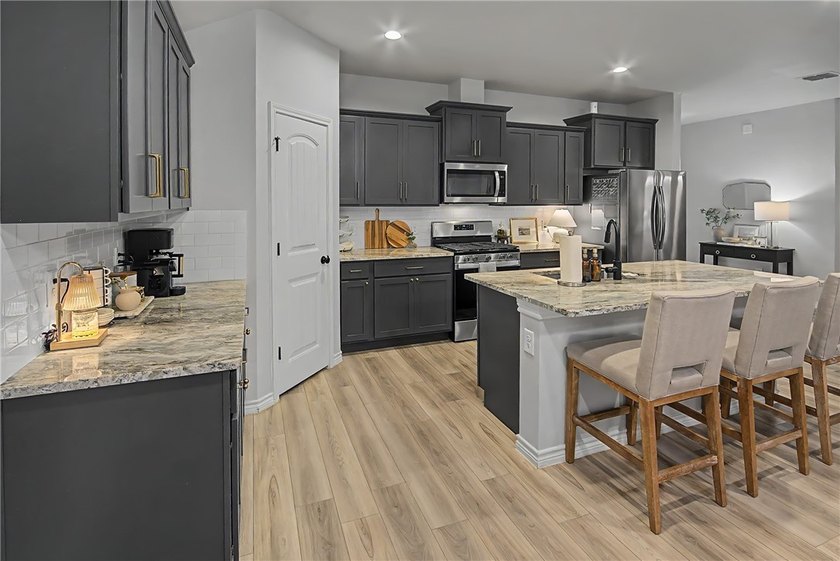 Welcome to this beautifully maintained one-story home in the - photo 6